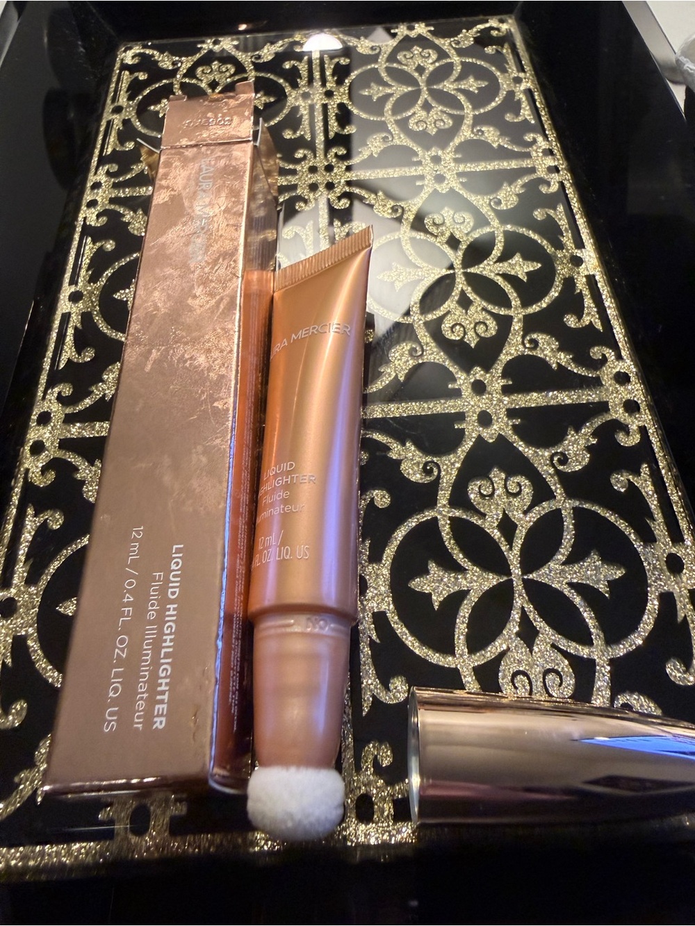 laura mercier Liquid Highlighter - champagne pink